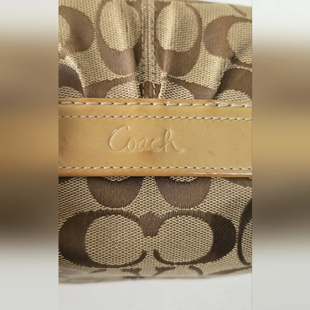 Coach Signature bi‎ fold wallet